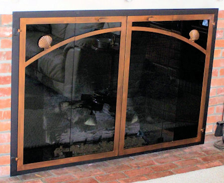 Over size Nauset fireplace doors black frame, antique copper vice bi fold doors and standard smoke glass